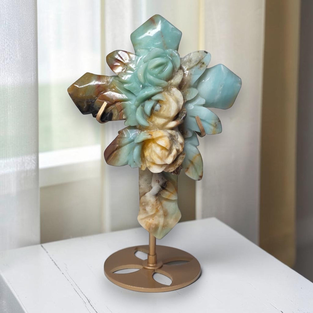 Amazonite crystal cross sculpture with carved roses on gold-tone stand