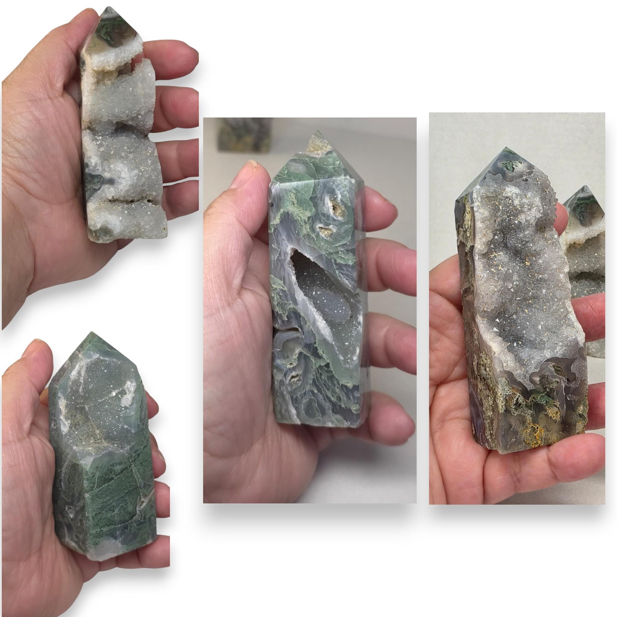 Moss agate drusy tower held in hand; dark green stone with white crystal clusters