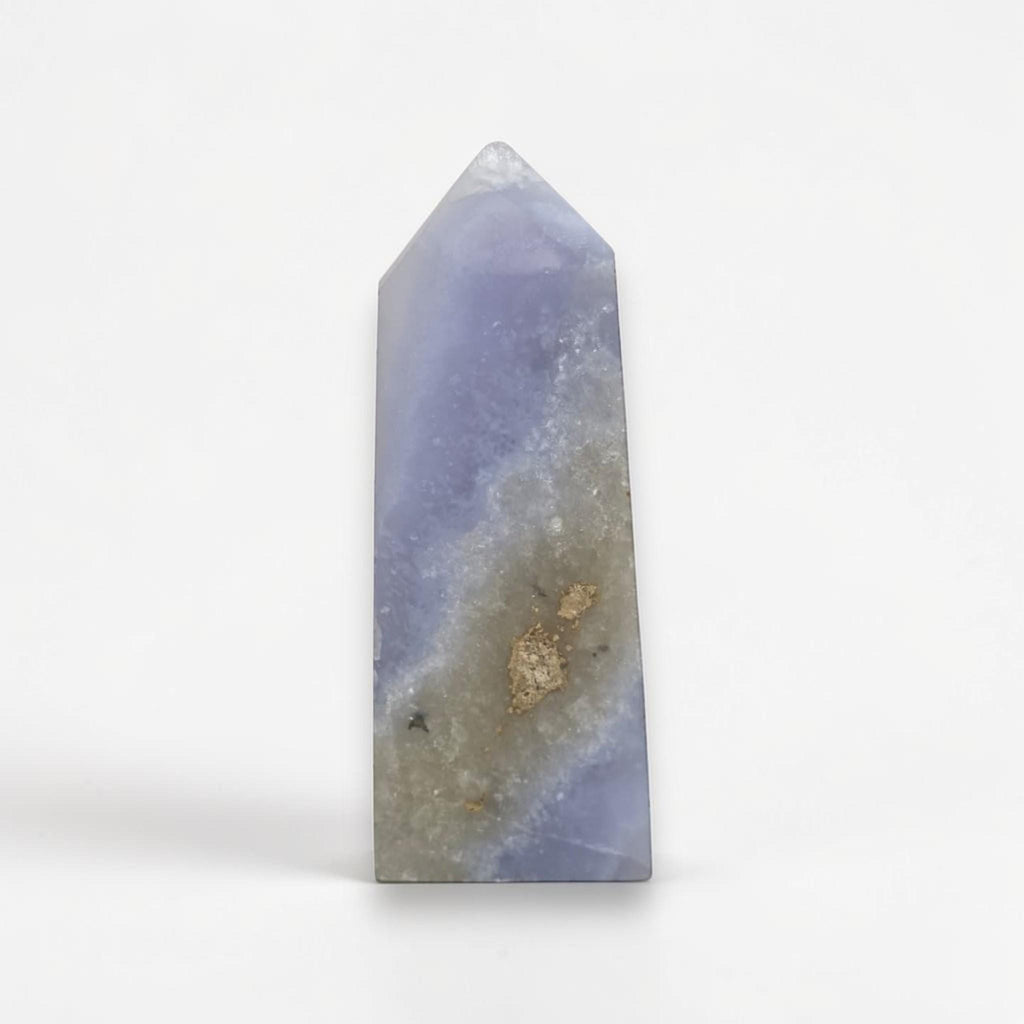 Blue-violet druzy agate crystal point with smooth faceted sides and pointed tip