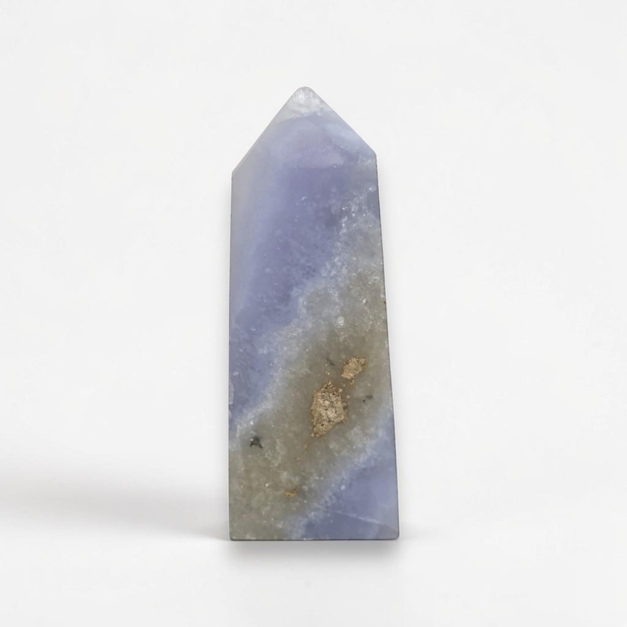 Blue-violet druzy agate crystal point with smooth faceted sides and pointed tip