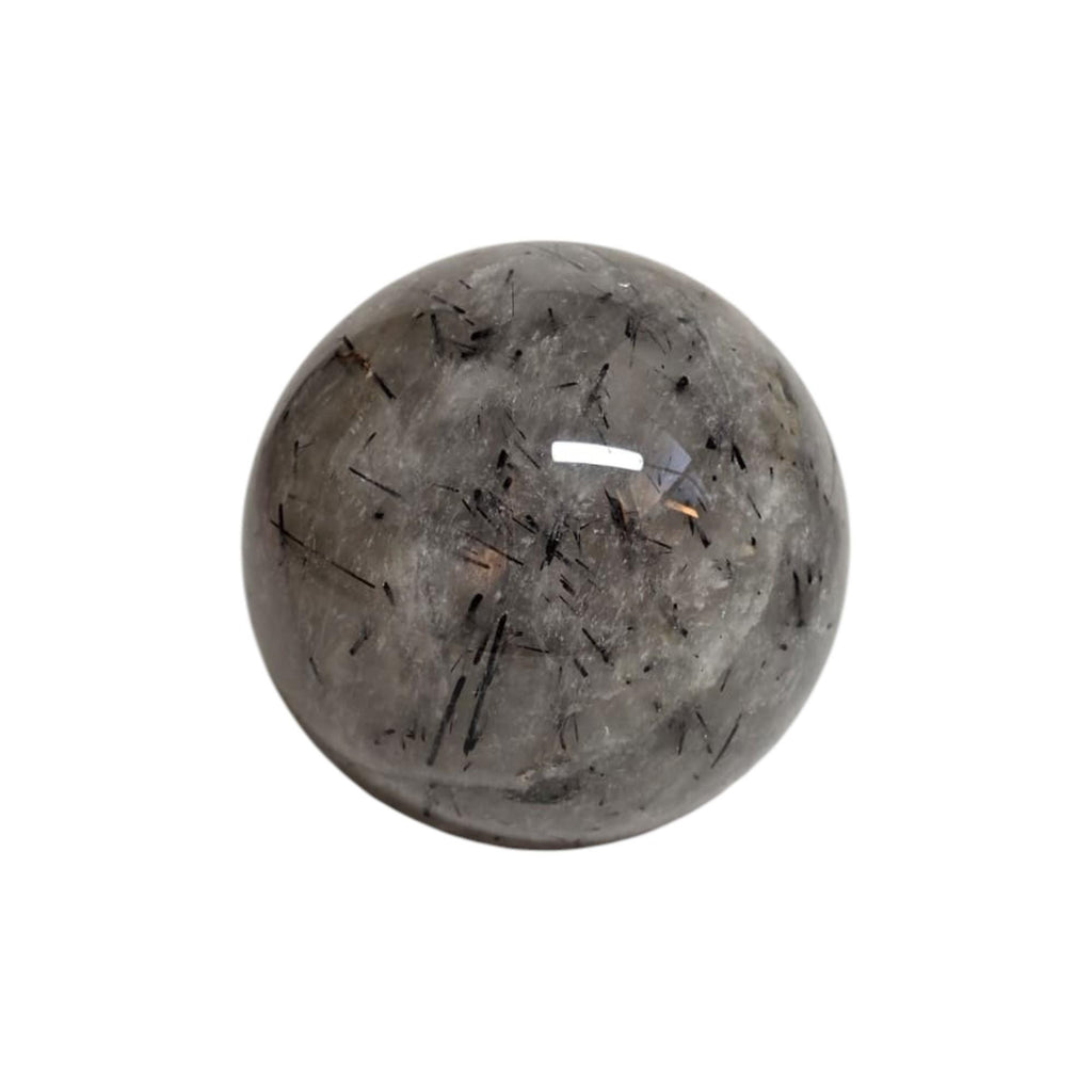 Polished quartz sphere with black needle inclusions and glassy highlight, 66mm