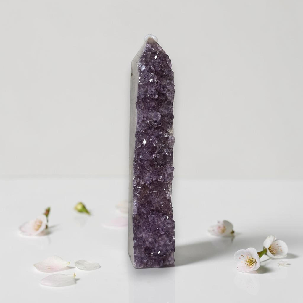 Amethyst drusy crystal tower, medium-dark purple druzy surface with clear quartz cap