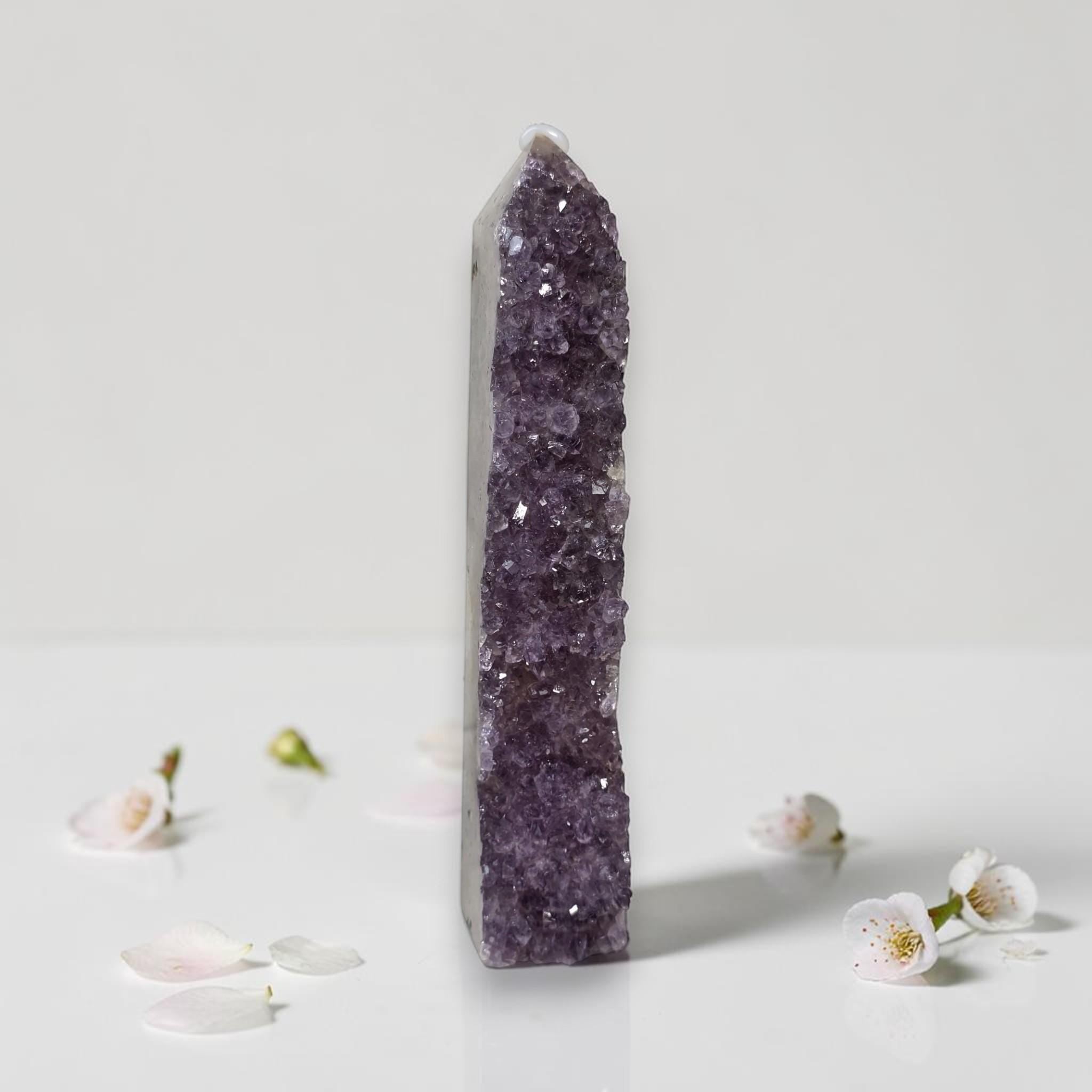 Amethyst drusy crystal tower, medium-dark purple druzy surface with clear quartz cap