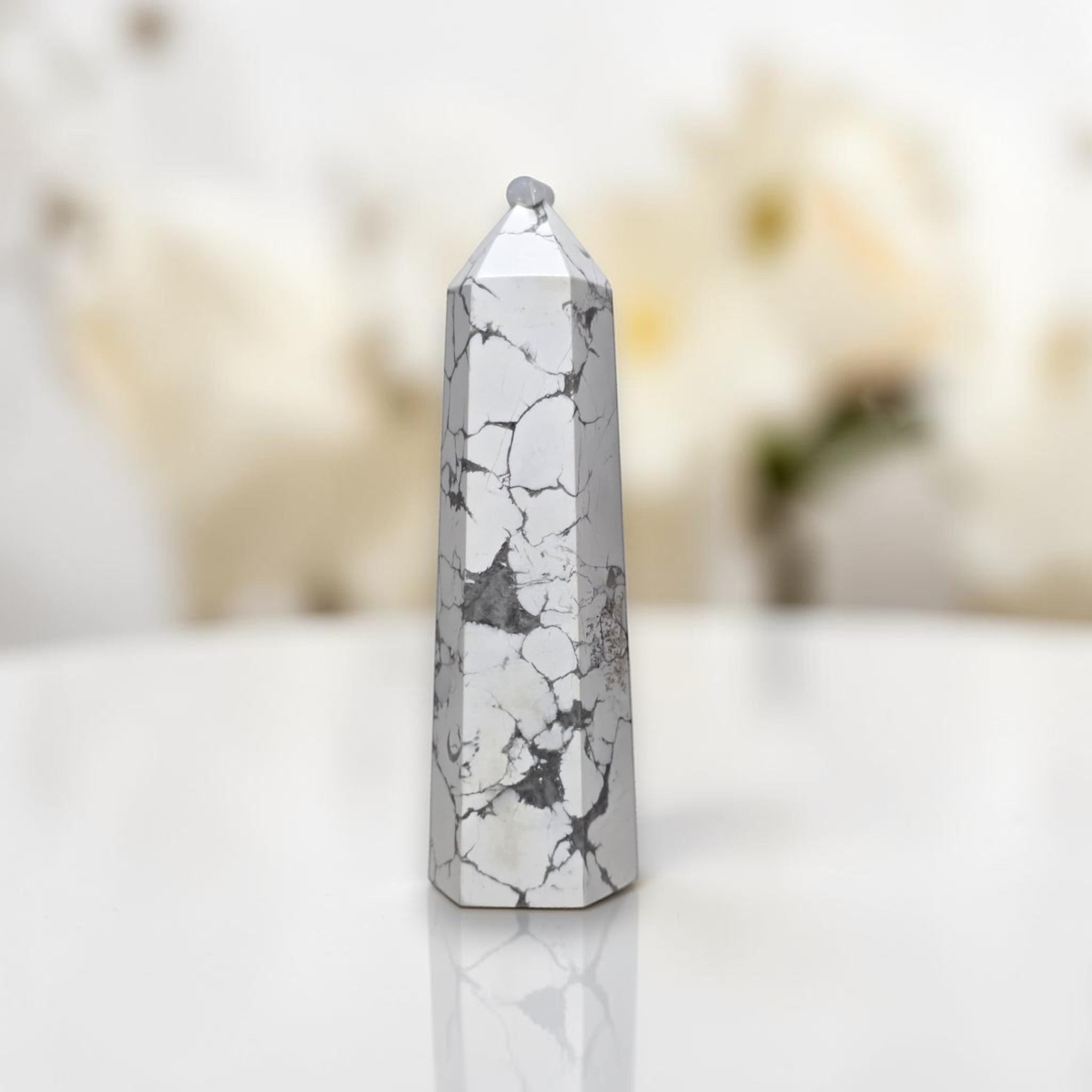 White howlite tower with gray veining, pointed tip