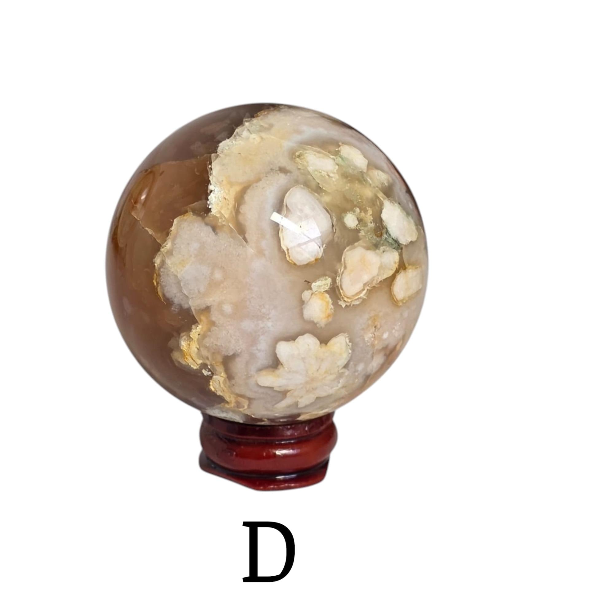 Flower agate drusy sphere on dark red base, translucent dome with cream and tan crystal bits