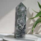 Moss agate obelisk with pointed top and sparkling druzy texture, green and gray bands