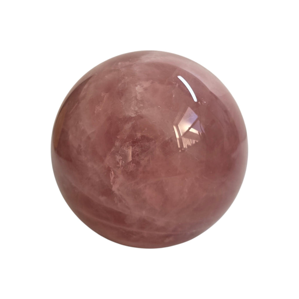 Rose quartz crystal sphere, smooth polished mauve-pink with bright glossy highlight