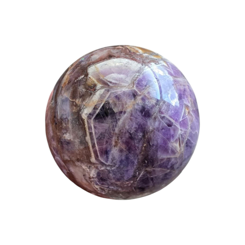 Amethyst quartz crystal sphere, angled close-up with purple crystals and reflective cuts