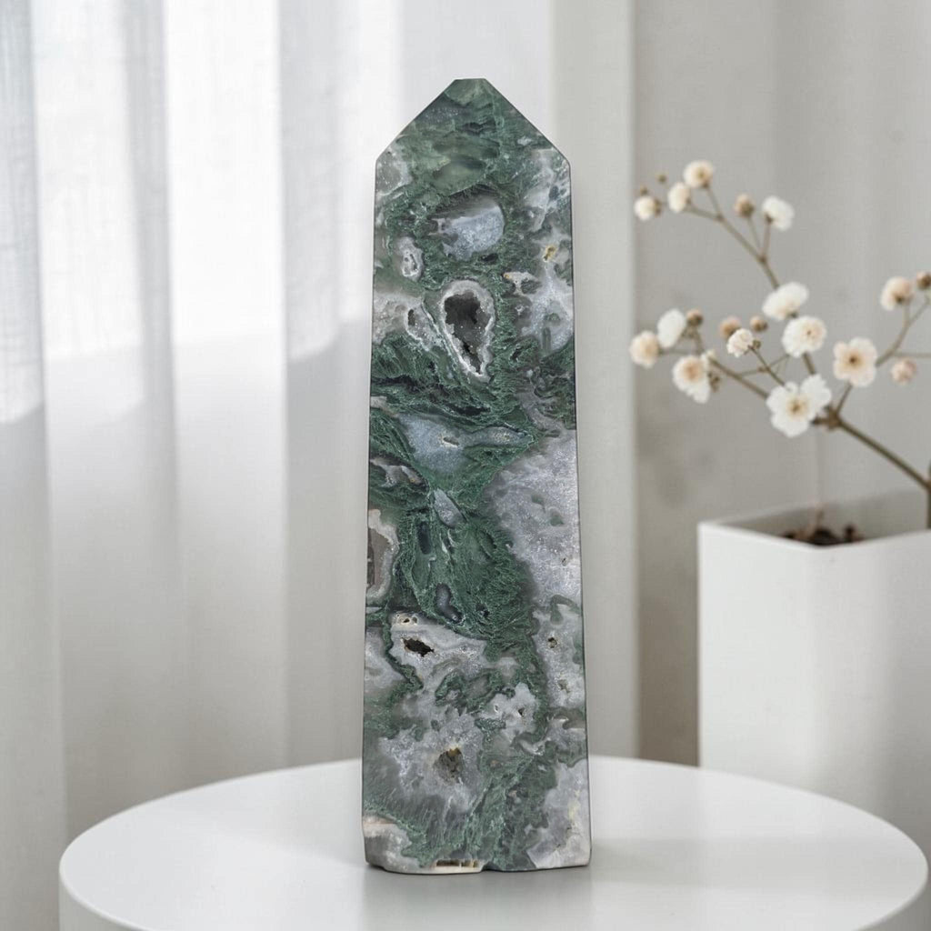 Green moss agate drusy obelisk tower crystal, faceted edges and banded texture