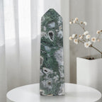 Green moss agate drusy obelisk tower crystal, faceted edges and banded texture