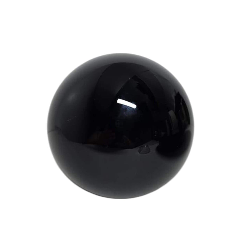 Black obsidian sphere with rounded shape and smooth mirror-like sheen
