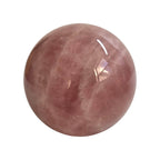 Rose quartz crystal sphere, smooth rounded pink stone with glossy reflection