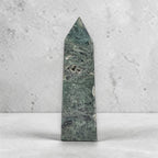 Green moss agate obelisk crystal tower with pointed top and natural pits