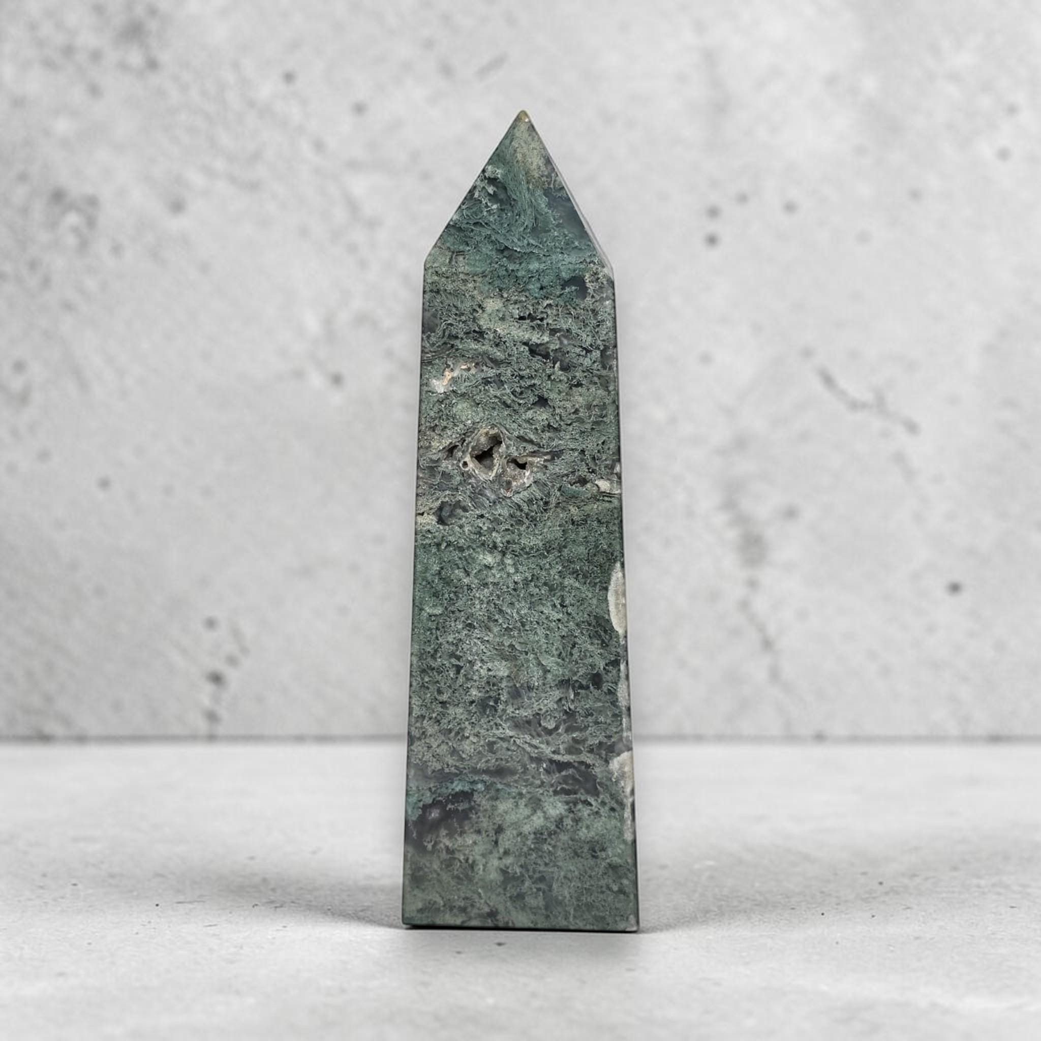 Green moss agate obelisk crystal tower with pointed top and natural pits