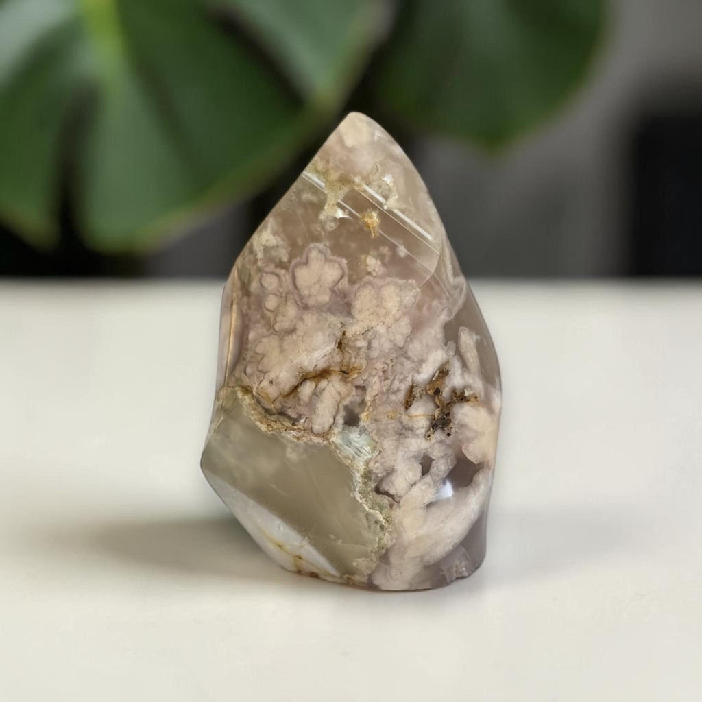 Agate flame crystal, translucent beige with white druzy inclusions and a glossy polished face