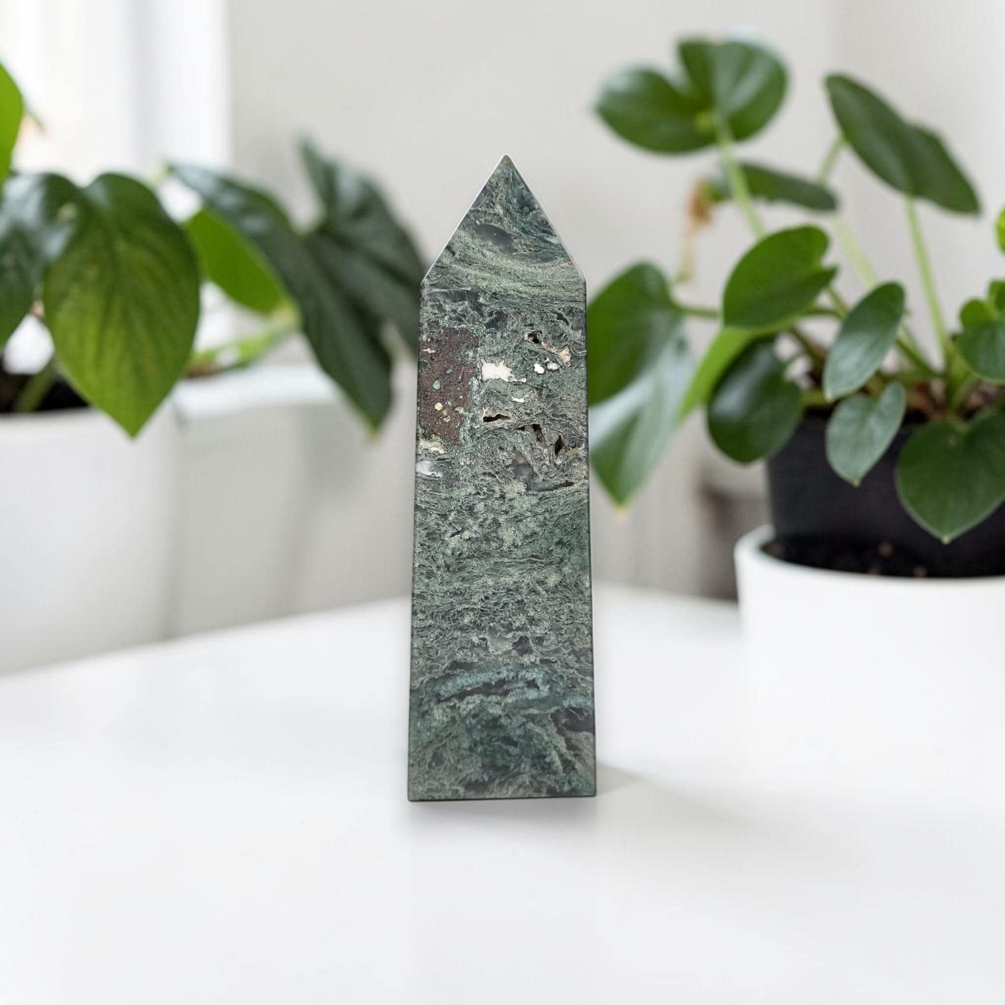 Green moss agate obelisk crystal tower with pointed top and speckled agate pattern