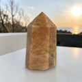 Sunstone obelisk point tower stone, polished brown-gold with faceted sides
