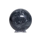 Dark gray jasper crystal ball sphere with glossy swirled texture on clear stand