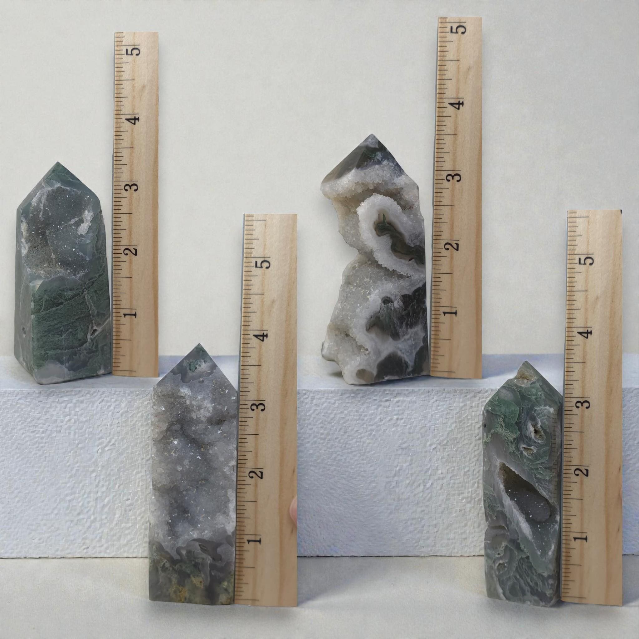Moss agate drusy towers set with mixed dark green and white druzy, shown with rulers