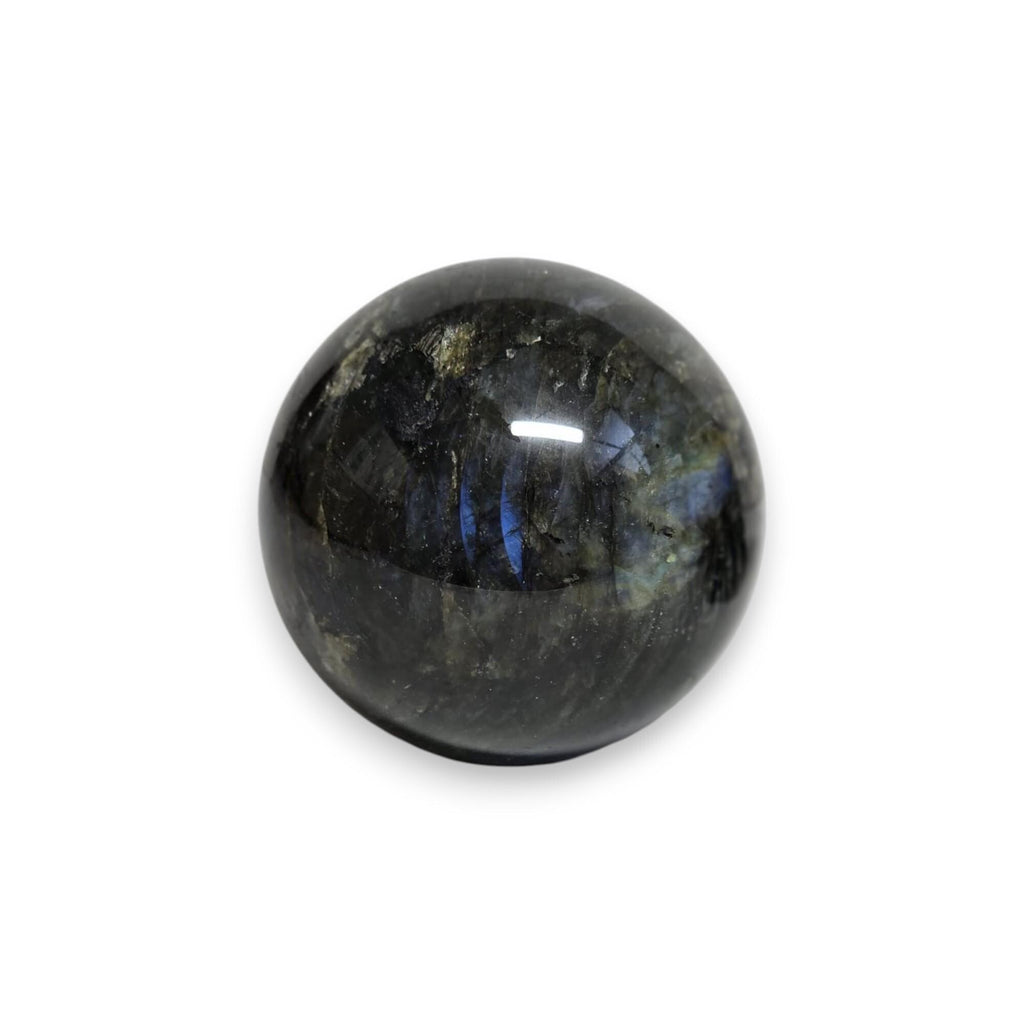 Polished labradorite sphere with subtle blue sheen in dark stone