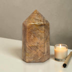 Obelisk point tower stone, polished golden-brown with angular pointed top