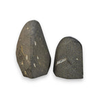 Amethyst quartz crystal pieces showing dark backs with light striations and small yellow flecks