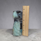 Amazonite eagle head sculpture in blue-gray stone, carved beak and wing