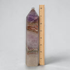 8 in gemstone tower, amethyst purple with lace-like tan bands and faceted tip