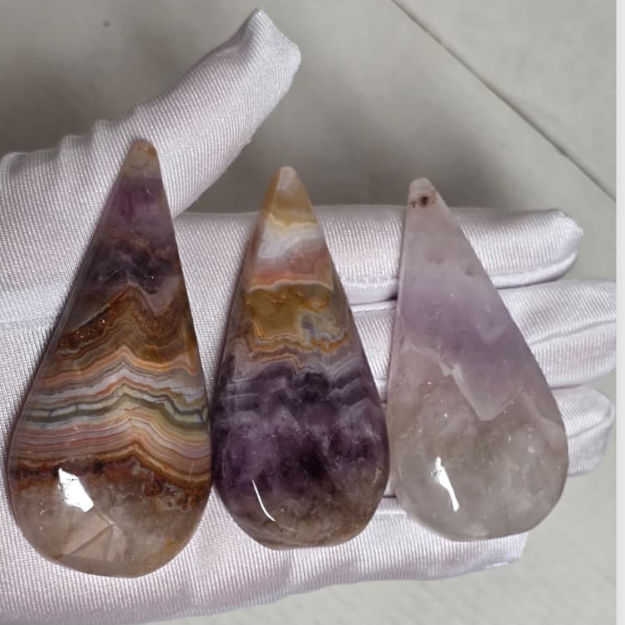 Amethyst lace agate raindrop teardrops closeup showing banding detail