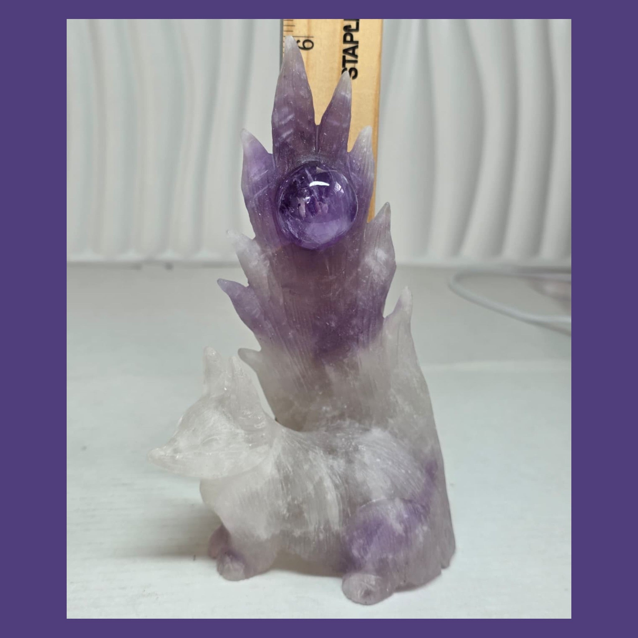 Amethyst nine-tailed fox carving size reference with ruler showing 6 inches