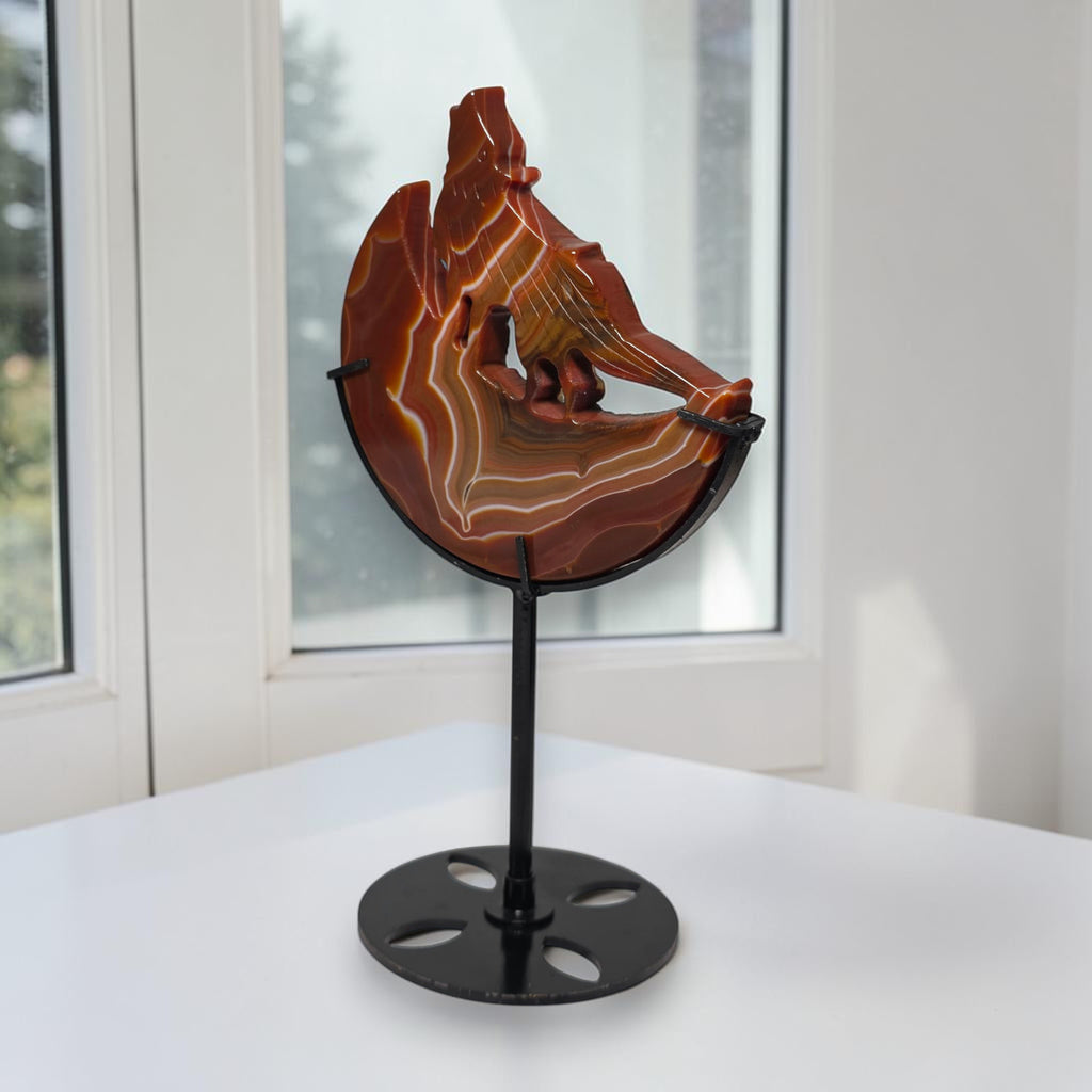 Banded agate wolf moon sculpture angle view