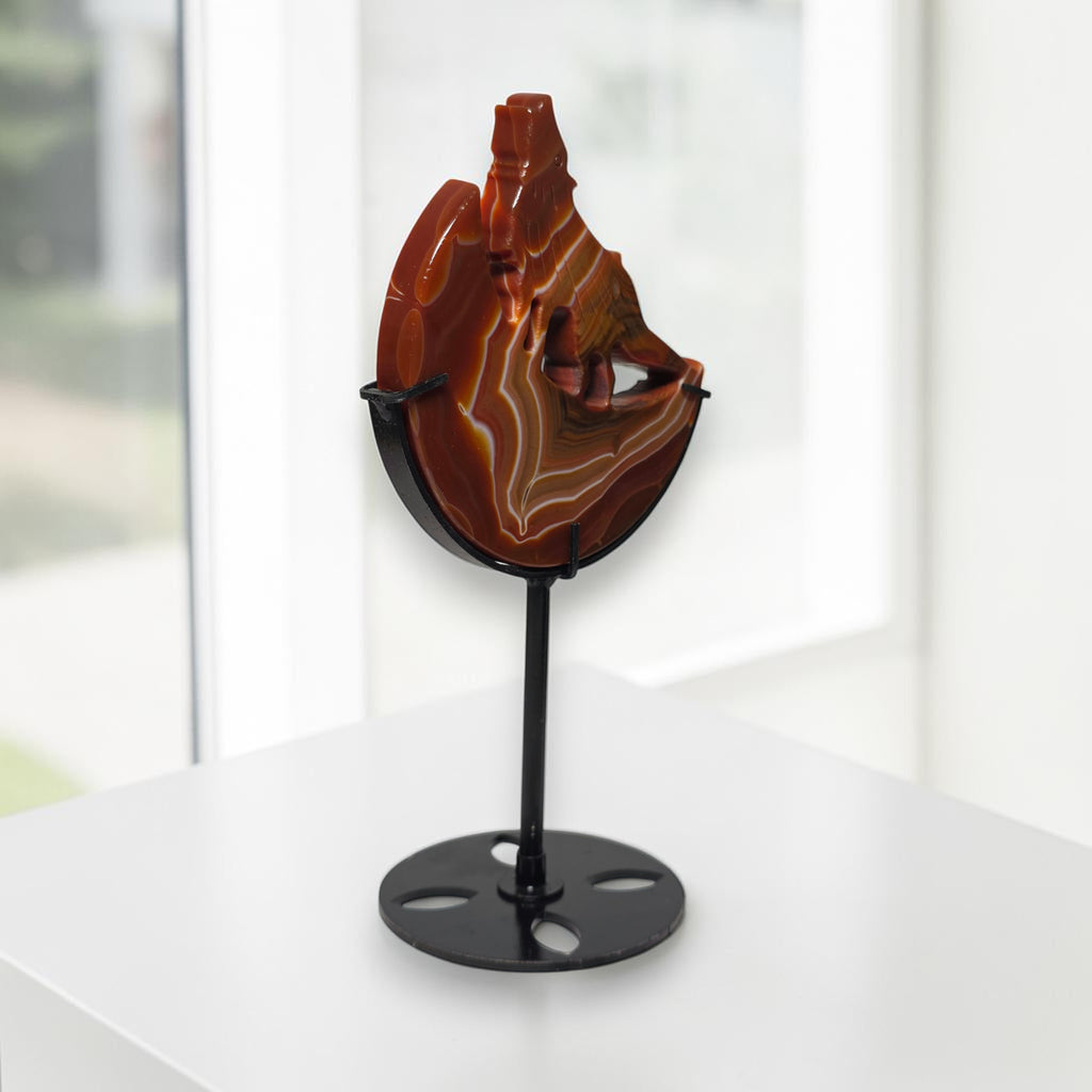 Banded agate wolf moon sculpture side view