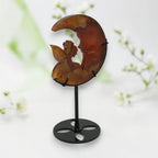 Banded agate moon fairy, back view showing natural stone banding and fairy silhouette