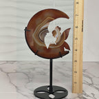 Banded agate moon fairy sculpture with ruler showing approximately 7 inches height