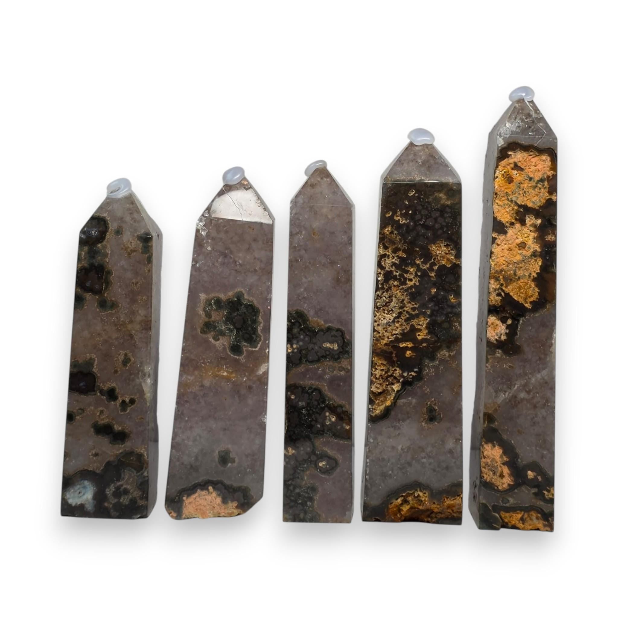 Amethyst drusy crystal tower set, smoky gray stone with golden mineral veining