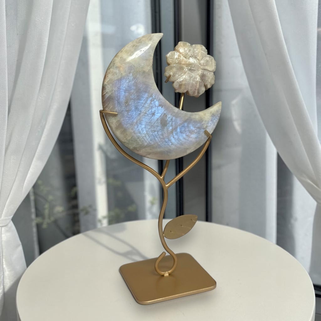 Blue flash moonstone crescent moon with carved flower on gold tone stand