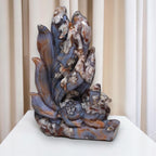Nine-tailed fox crystal sculpture, blue and amber stone with white veining across tails