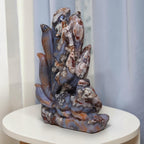 Nine-tailed fox agate carving with visible carving lines and white crystal-like inclusions