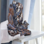 Hand-carved nine-tailed fox crystal sculpture, blue and tan with white veining details