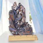Nine-tailed fox agate carving with layered blue bodies and white crystal-like patterns