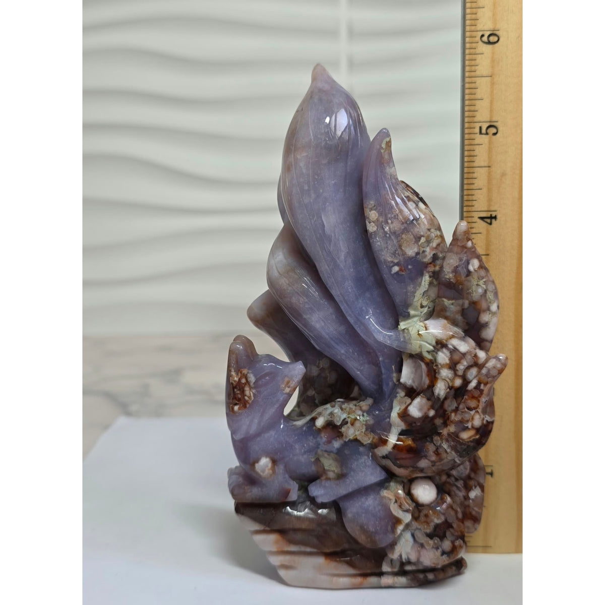 Blue Flower Agate nine tailed fox beside ruler showing 6 inch height