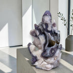 Blue Flower Agate Nine Tails Fox freeform - front left view in hand