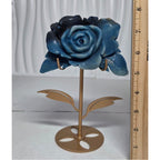 Natural Trolleite rose carving with size reference ruler, approximately 7-8 inches tall on gold stand
