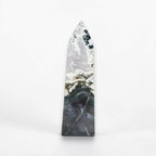 Polished moss agate tower, triangular top with white veining, dark base and faint green speckles