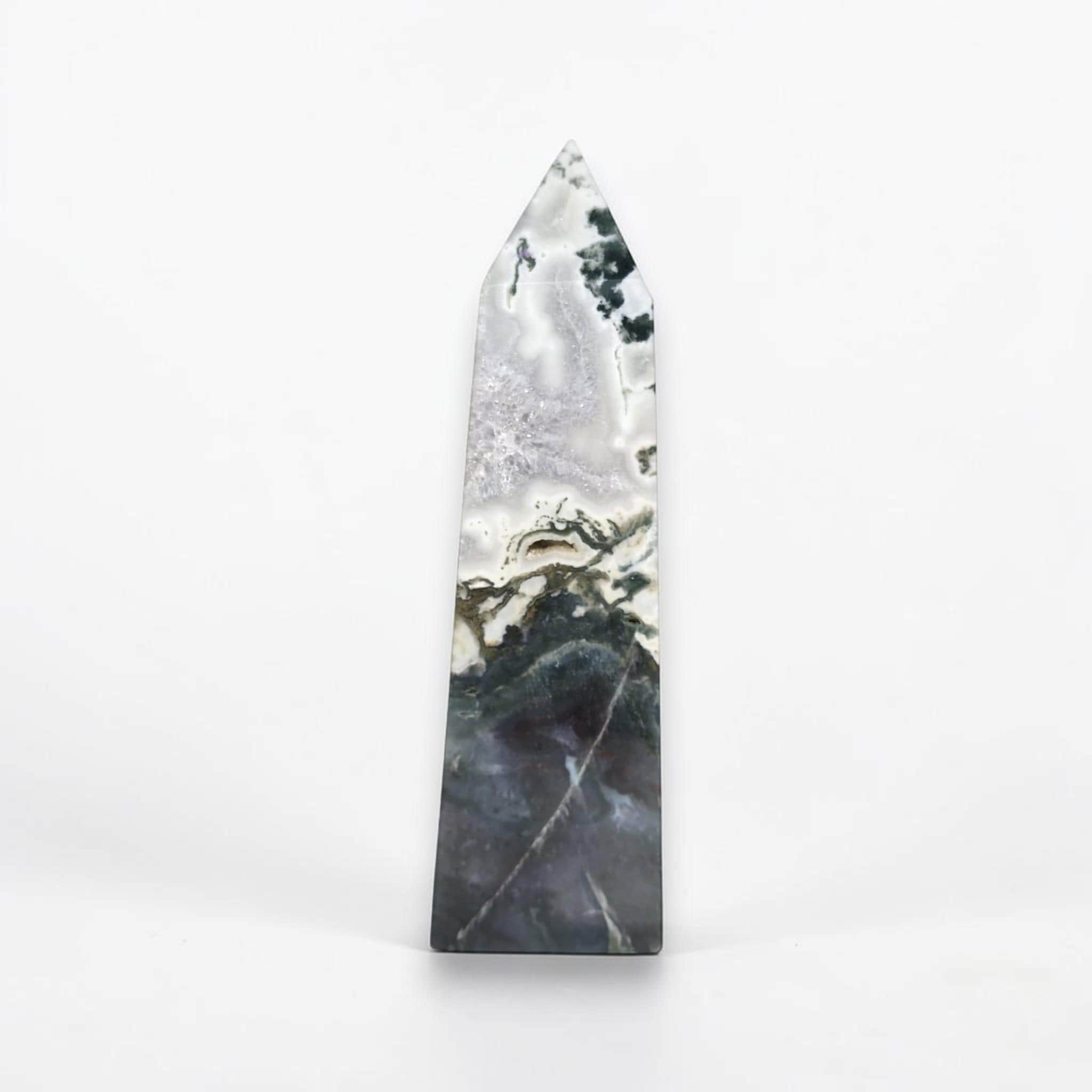 Polished moss agate tower, triangular top with white veining, dark base and faint green speckles