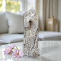 White druzy lace stone tower with pointed top and drilled hollow opening