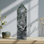 Moss agate crystal obelisk, tall pointed form with glittering white druzy patches and green