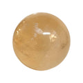 Polished citrine sphere gemstone, warm golden translucent look with bright highlights