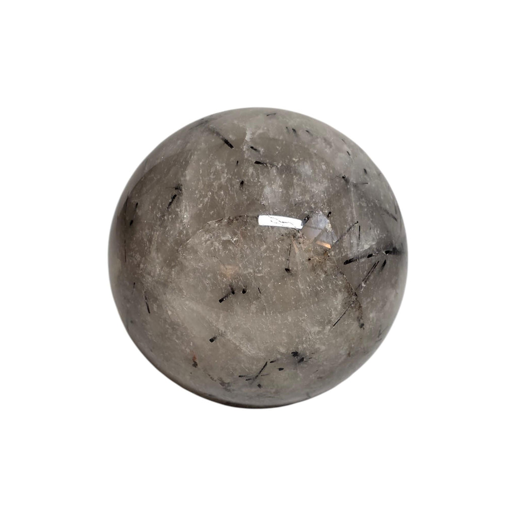 Polished tourmaline quartz sphere with dark needle-like inclusions and glossy finish