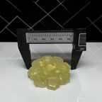 Natural Citrine flower carving close-up showing warm golden color